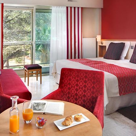 The Originals Boutique, Hotel Les Strelitzias Жюан-ле-Пен Екстер'єр фото